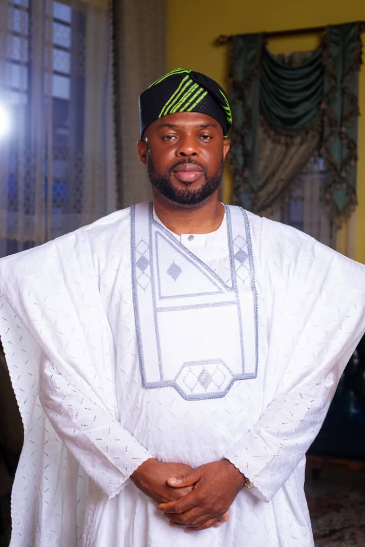 Illustration of Ademola Joseph Onigbokun addressing a gathered crowd